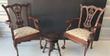 Two carved wooden doll chairs with a round side table - thumbnail 1 of 7