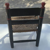 Small black-painted wooden chair with woven seat and floral decoration - thumbnail 5 of 8