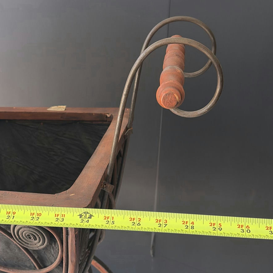 Antique wrought-iron baby carriage with decorative scrollwork - image 6 of 8