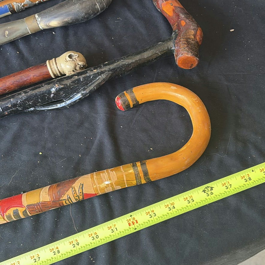 Assorted decorative walking canes and staffs - image 5 of 7