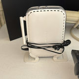 Netgear Router, Ameriphone Alarm Clock, Surge Protector, and Electronics Accessories - thumbnail 2 of 9