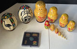 Matryoshka nesting dolls with decorative eggs and Alaska souvenir stickers - thumbnail 1 of 6
