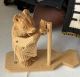 Cloth dolls, wooden folk-art figures, and a glitter globe - thumbnail 6 of 8