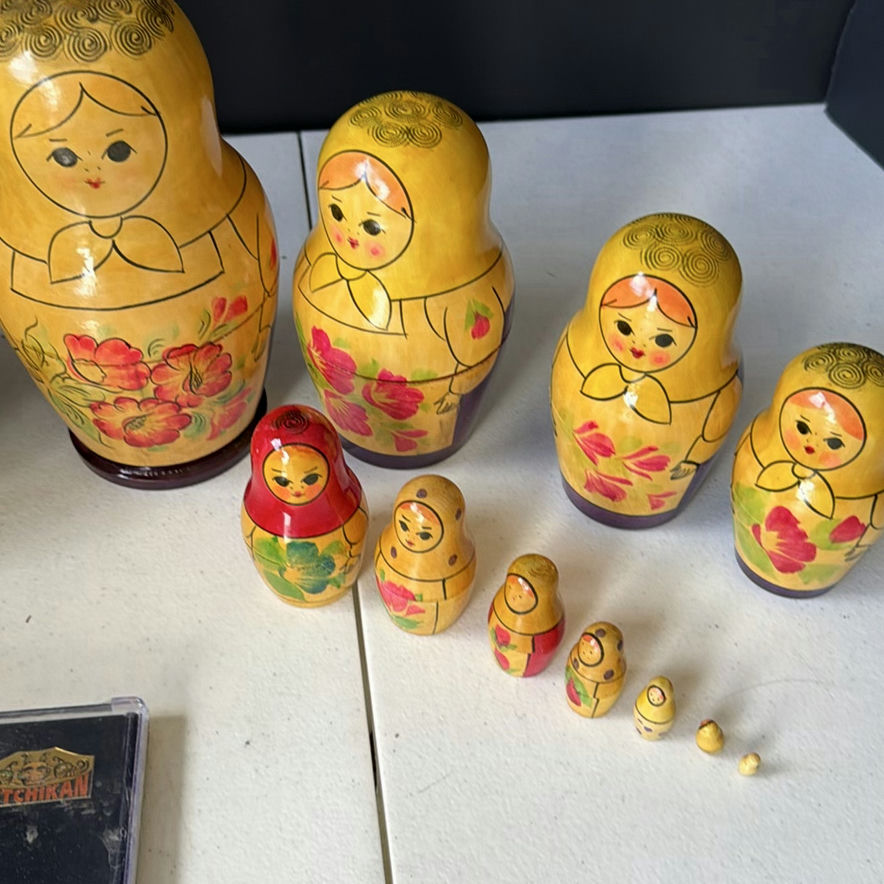 Matryoshka nesting dolls with decorative eggs and Alaska souvenir stickers - image 5 of 6