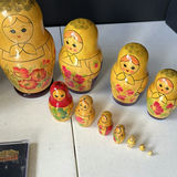 Matryoshka nesting dolls with decorative eggs and Alaska souvenir stickers - thumbnail 5 of 6