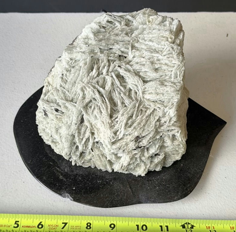 White fibrous crystal mineral on rock matrix - image 1 of 5