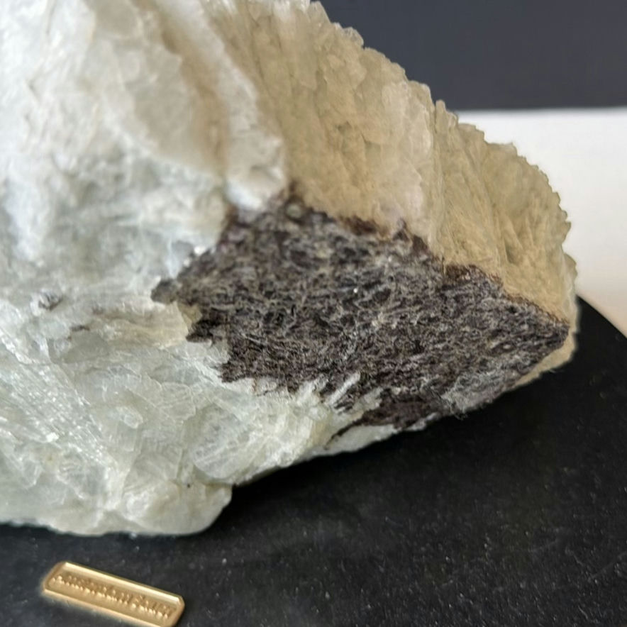 White fibrous crystal mineral on rock matrix - image 3 of 5