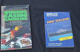 Travel guides, gambling books, and a clock print - thumbnail 5 of 6