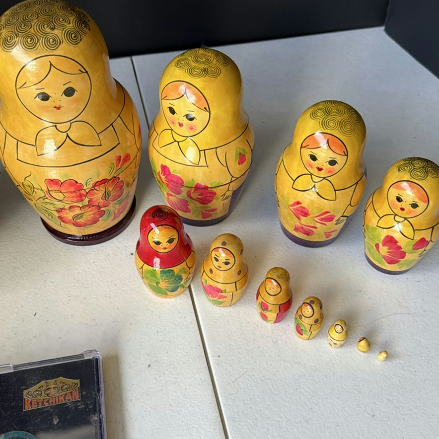 Matryoshka nesting dolls with decorative eggs and Alaska souvenir stickers - image 4 of 6
