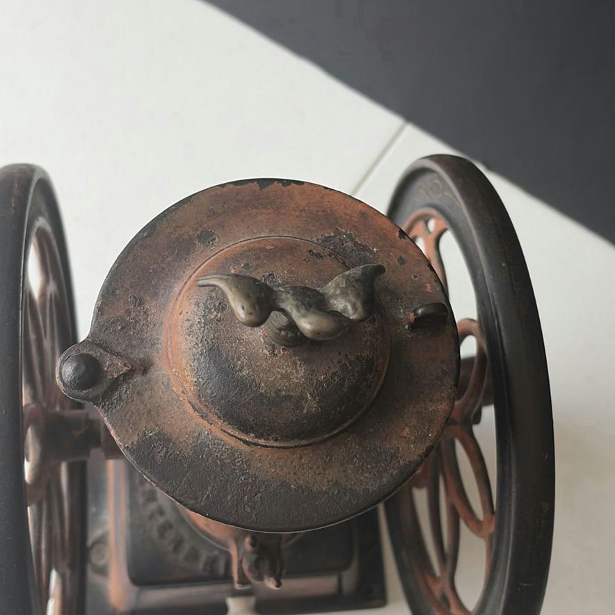 Antique hand-crank coffee grinder with dual wheels - image 6 of 6