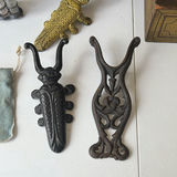 Antique collection: jewelry pouch, ornate metal pieces, glass cruet set, and wooden boxes - thumbnail 3 of 8