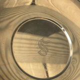 Assorted silver plate serving trays and bowls with a patterned woven rug - thumbnail 4 of 8