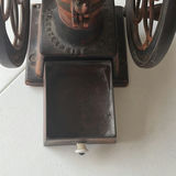 Antique hand-crank coffee grinder with dual wheels - thumbnail 5 of 6