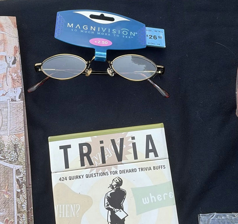 Assorted books, travel journals, and personal accessories - image 7 of 13