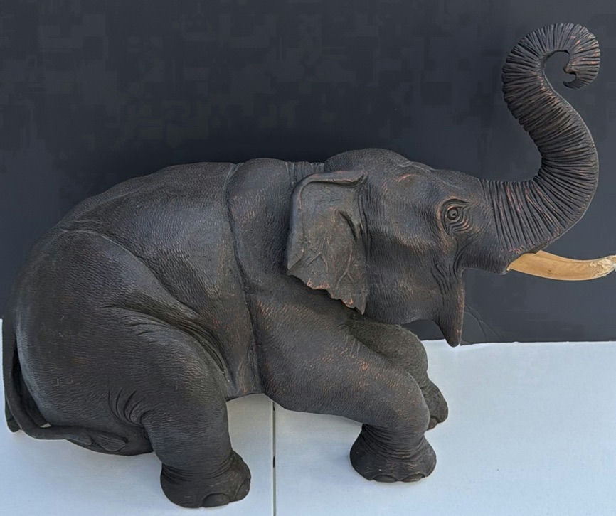 Elephant statue with raised trunk - image 1 of 9