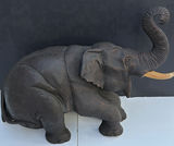 Elephant statue with raised trunk - thumbnail 1 of 9