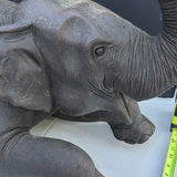 Dark elephant statue with raised trunk - thumbnail 6 of 8