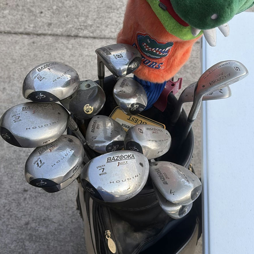 Golf bag with clubs and assorted accessories - image 8 of 12
