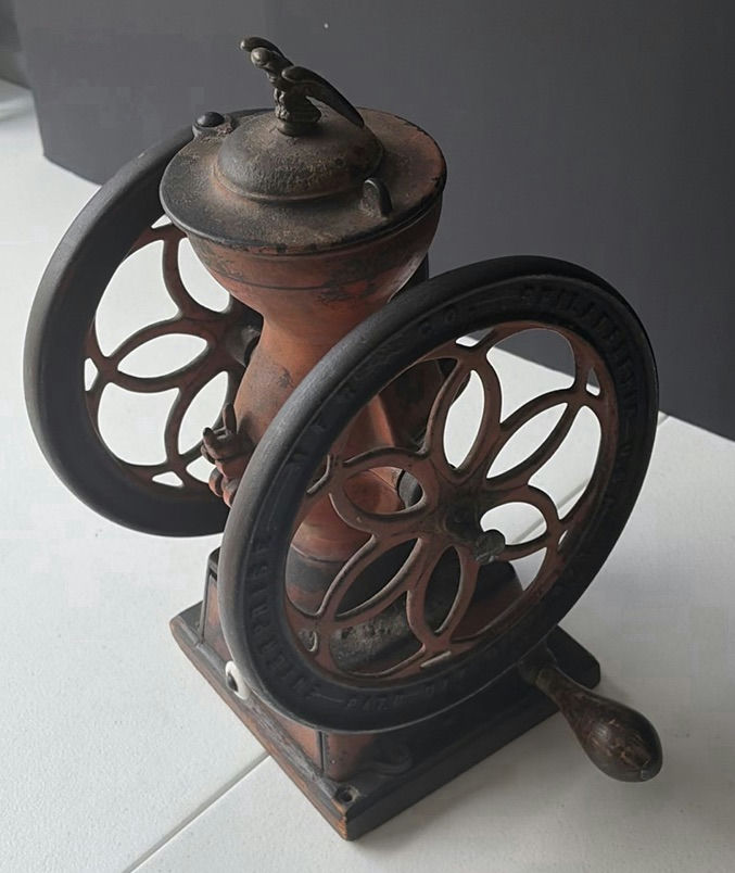 Antique hand-crank coffee grinder with dual wheels - image 2 of 6