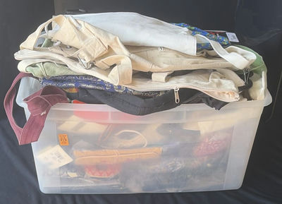 Clear plastic bin with assorted textiles - Image 1 of 5