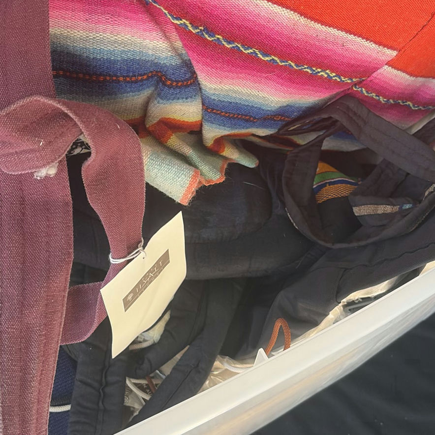 Clear plastic bin with assorted textiles - image 5 of 5