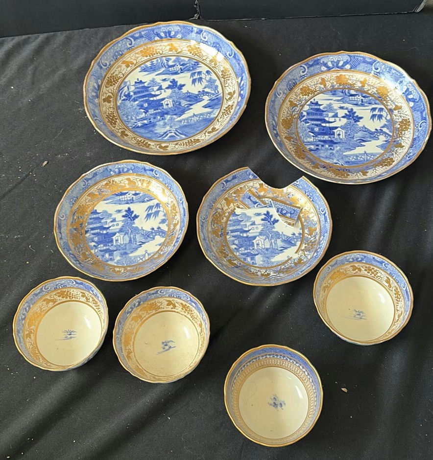 Blue and white porcelain bowls and plates with gold trim - image 1 of 7