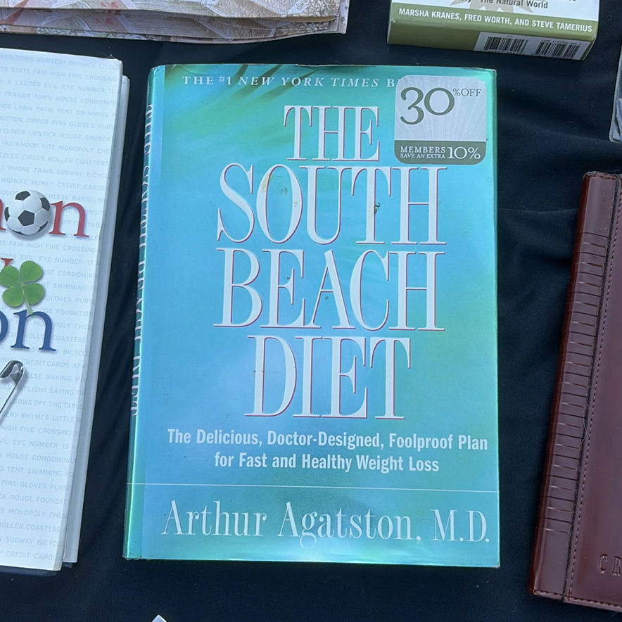 Assorted books, travel journals, and personal accessories - image 5 of 13
