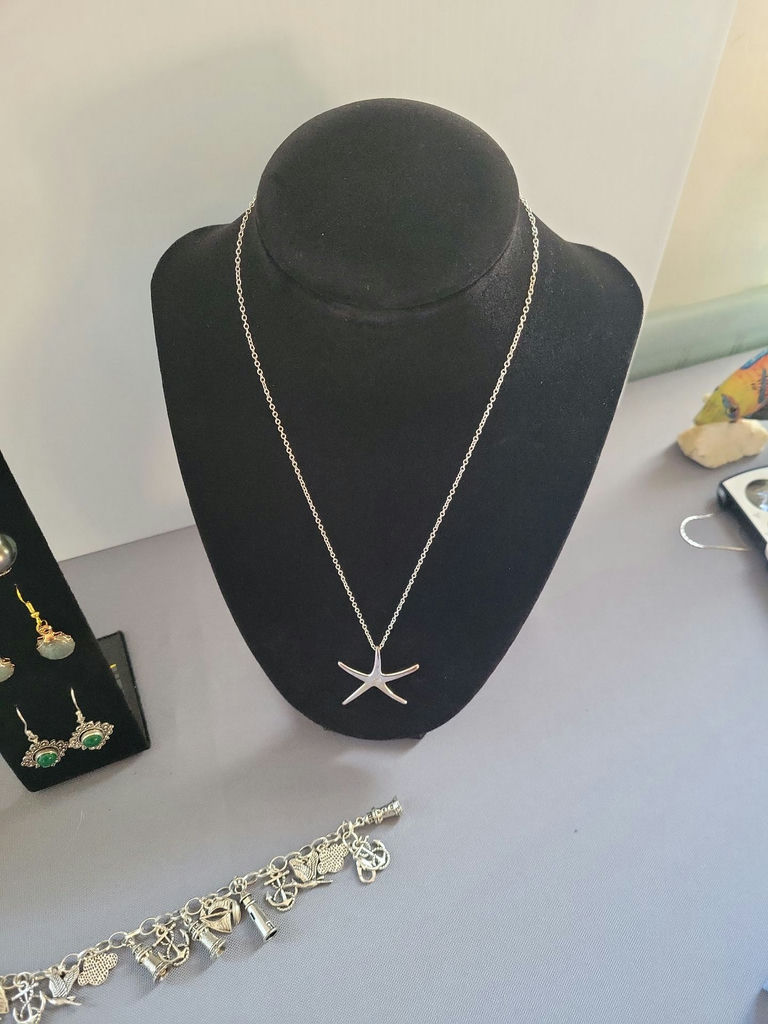 Silver jewelry collection with nautical motifs and starfish pendant - image 15 of 18