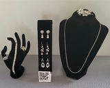 Swarovski Elements and Faux Diamond jewelry collection: bracelet, necklace, rings and earrings with floral hair accessory - thumbnail 1 of 17