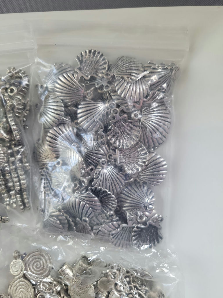 Assorted metal charms and jewelry findings - image 5 of 14