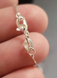Assorted jewelry collection: rings, earrings, and pendant necklace - thumbnail 14 of 15