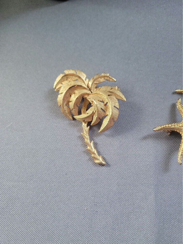 Gold-tone palm tree, starfish, and lighthouse pins - image 2 of 9