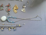 Assorted Jewelry Collection: necklaces, bracelets, earrings, and pendants - thumbnail 13 of 14