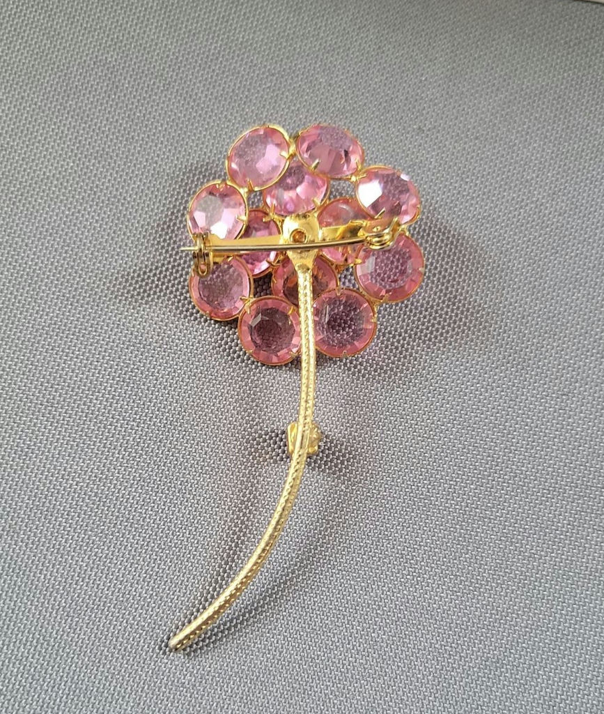 Pink fashion jewelry collection with floral motifs - image 10 of 15