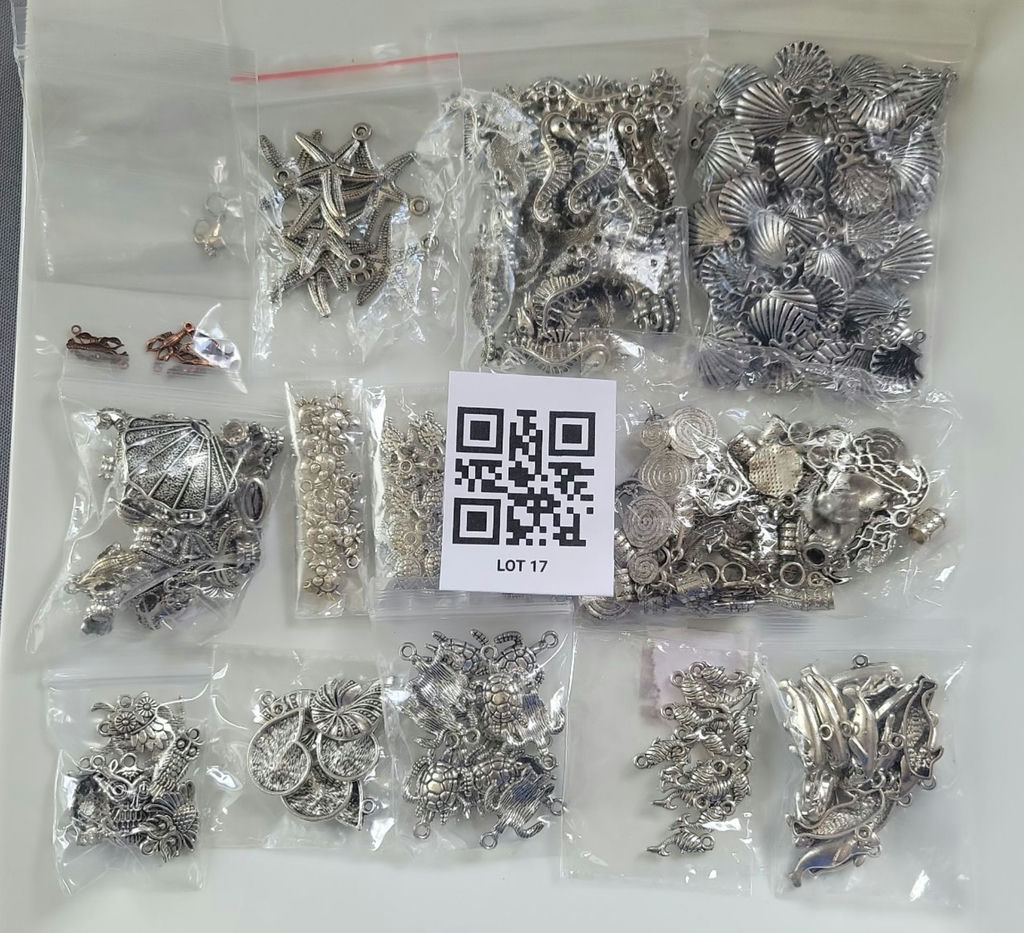 Assorted metal charms and jewelry findings - image 1 of 14