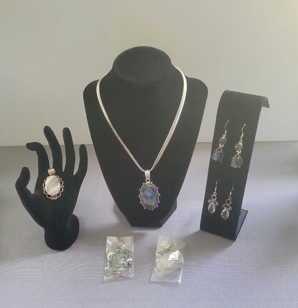 Assorted jewelry collection with pendants and earrings - image 1 of 12