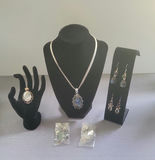 Assorted jewelry collection with pendants and earrings - thumbnail 1 of 12