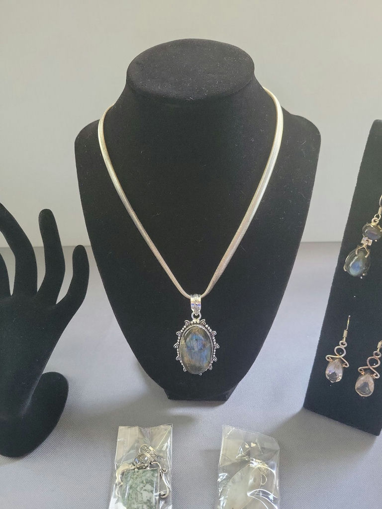 Assorted jewelry collection with pendants and earrings - image 4 of 12