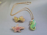 Betsy Johnson gold-tone rhinestone seahorse and two hair clips - thumbnail 1 of 6