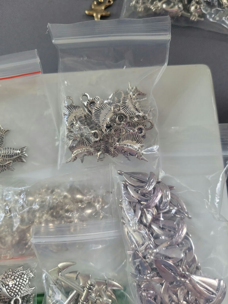 Assorted silver-tone metal charms and pendants - image 5 of 19