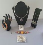 Assorted jewelry: necklace, bracelets, rings, and earrings - thumbnail 1 of 19