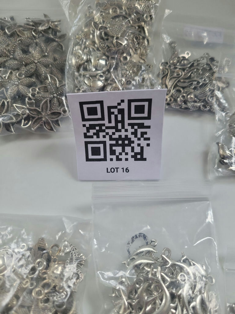 Assorted silver-tone metal charms and pendants - image 18 of 19