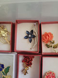 Assorted decorative brooch pins in display boxes - thumbnail 3 of 20