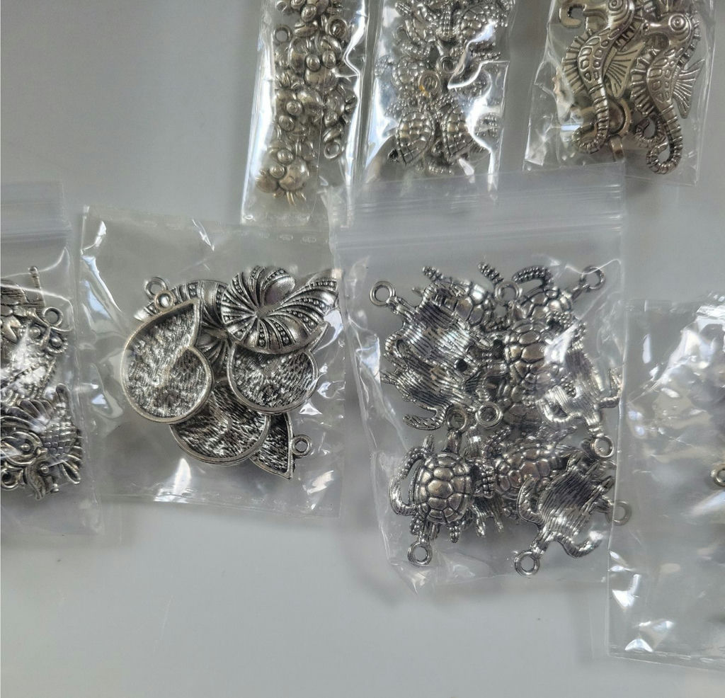 Assorted metal charms and jewelry findings - image 12 of 14