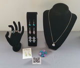 Assorted jewelry collection: rings, earrings, and pendant necklace - thumbnail 1 of 15