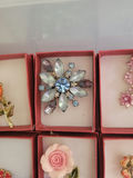 Assorted decorative brooch pins in display boxes - thumbnail 5 of 20