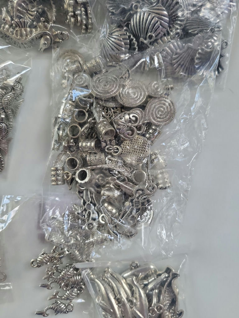 Assorted metal charms and jewelry findings - image 10 of 14