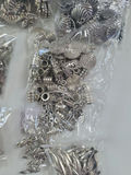 Assorted metal charms and jewelry findings - thumbnail 10 of 14