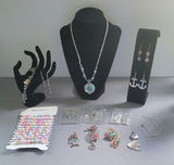 Assorted Jewelry Collection: necklaces, bracelets, earrings, and pendants - thumbnail 1 of 14