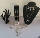Silver jewelry collection with nautical motifs and starfish pendant - thumbnail 1 of 18
